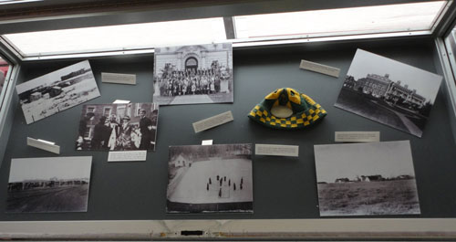 Display case with black & white photographs of campus life